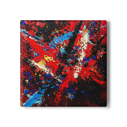 Ceramic coaster 'Reignite' with bold red, blue, and ivory abstract design; perfect gift for seniors.