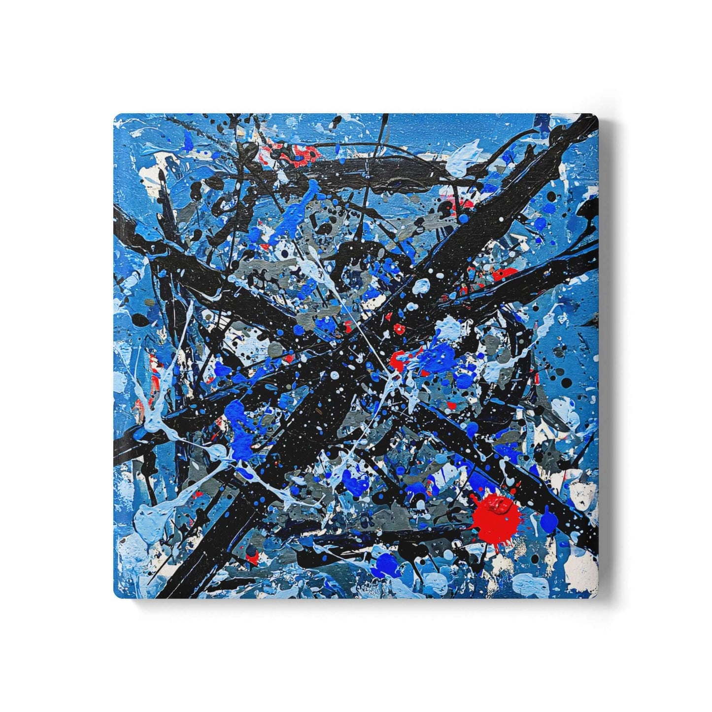 Ceramic coaster Shattered Sky with abstract expressionism art in deep blues, whites, and reds, ideal gift for seniors.